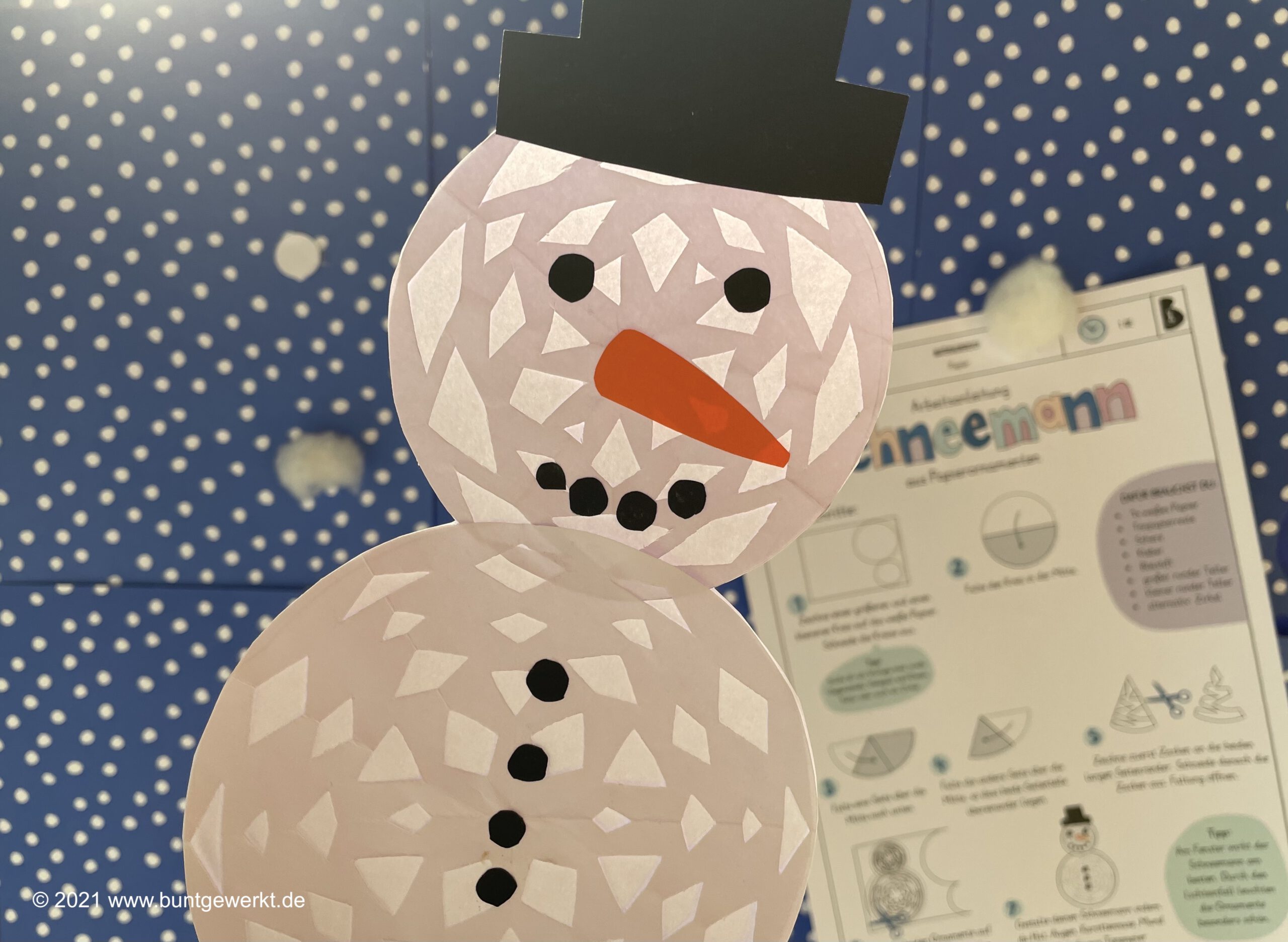 Schneemann Buntgewerkt